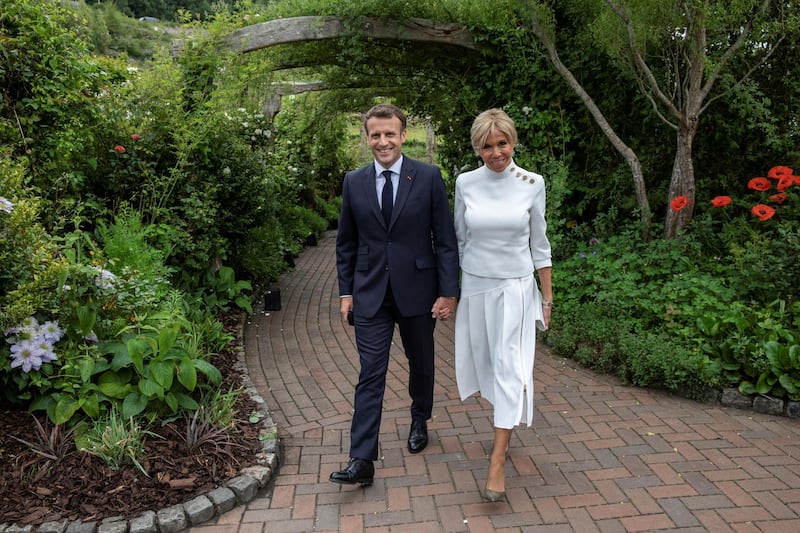 France's President Emmanuel Macron and his wife Brigitte attend a drinks reception on the sidelines of the G7 summit, at the Eden Project in Cornwall, Britain June 11, 2021. Jack Hill/Pool via REUTERS