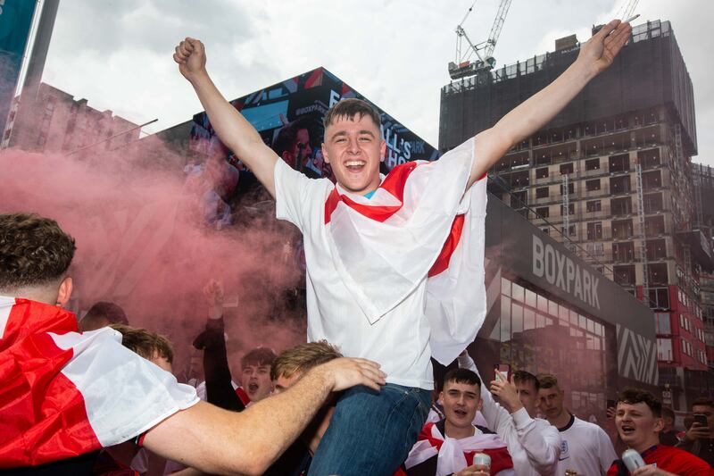 Fans arrive at Wembley stadium ahead of the Euros football final between England and Italy.