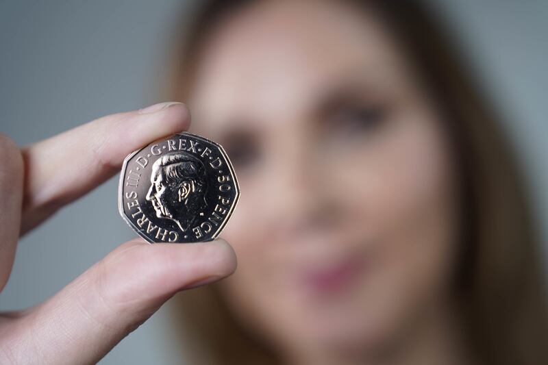 The first coins featuring the portrait of King Charles III are going into production at the royal mint in Pontyclun, Wales. All photos: PA