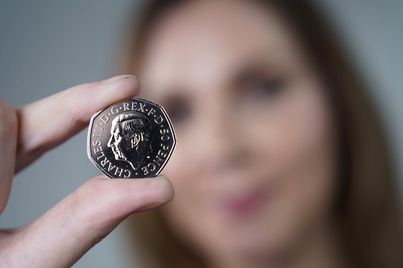 The first coins featuring the portrait of King Charles III are going into production at the royal mint in Pontyclun, Wales. All photos: PA