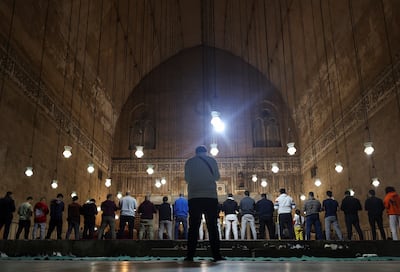Muslim worshippers take part in evening prayers at Al Sultan Hassan mosque in Cairo's medieval quarter. Reuters