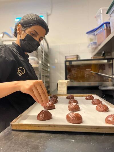 Saudi barista and assistant chef Asma Alamoudi, who works at Meraki cafe in Jeddah, wants to open her own bakery. Mariam Nihal / The National