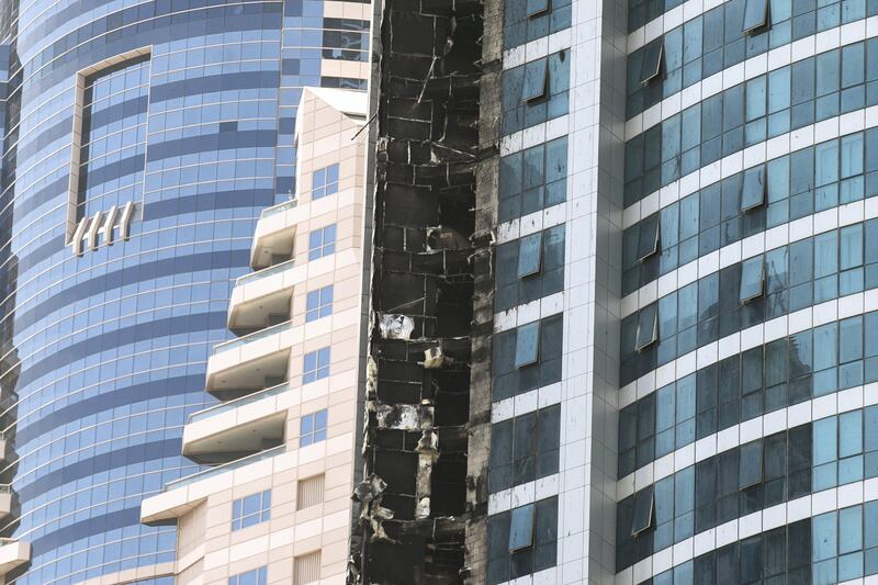 DUBAI, UNITED ARAB EMIRATES - AUG 4: 

Dubai Marina's Torch Tower, one of the world's tallest residential buildings, after a fire started last night.


(Photo by Reem Mohammed/The National)

Section: NA