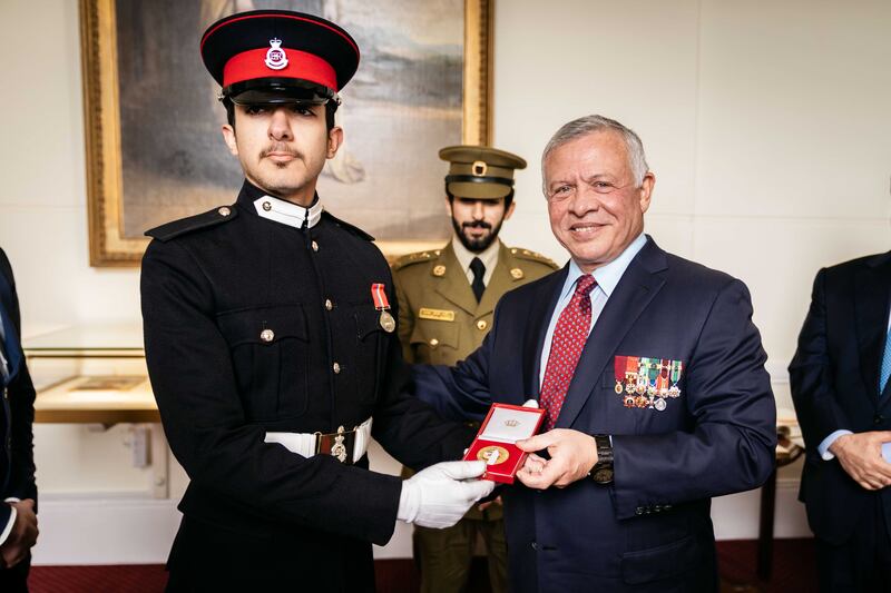 King Abdullah presents Sandhurst’s Al Hussein Medal to Bahraini Officer Cadet Sheikh Al Waleed Khalid Ahmed Al Khalifa, awarded to non-British cadets who showed the most significant improvement in performance during training