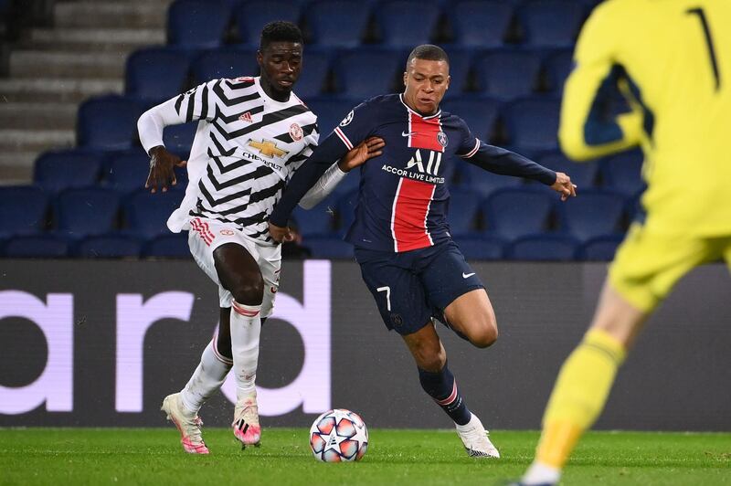 Axel Tuanzebe - 9: Injury meant he hadn't played since the Carabao cup game against Colchester last December, yet stood firm against some of the best players on the planet. Watching him beat and dispossess Mbappe was a joy. . AFP