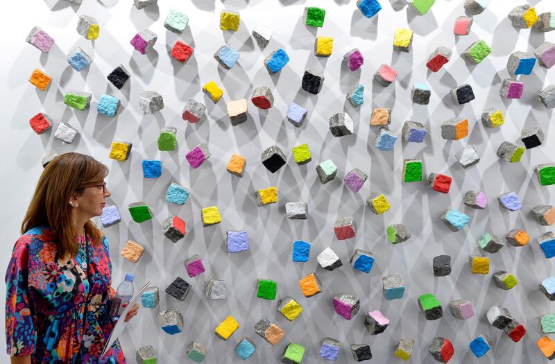 A visitor looks at an artwork during the opening of the 10th edition of the Beirut Art Fair in Beirut, Lebanon.  EPA