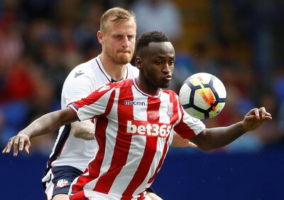 Soccer Football - Bolton Wanderers vs Stoke City - Pre Season Friendly - Bolton, Britain - July 29, 2017   Bolton's David Wheater and Stoke City's Saido Berahino   Action Images via Reuters/Carl Recine