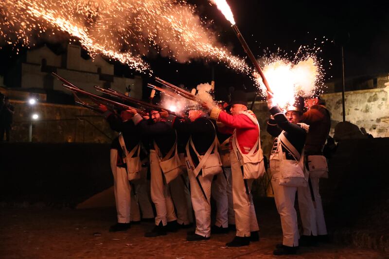 Extras fire their weapons during a historical recreation of the attack on the Fort of Graca in Elvas, Portugal, evoking the siege that took place in 1811 by the French army.   EPA 