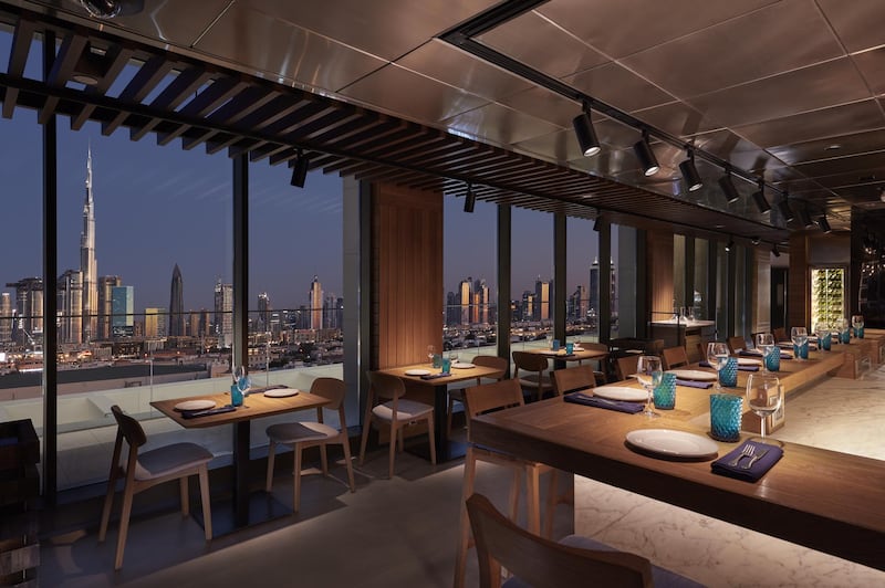 Tasca's floor-to-ceiling windows also look out over Dubai's Downtown skyline. Courtesy Mandarin Oriental