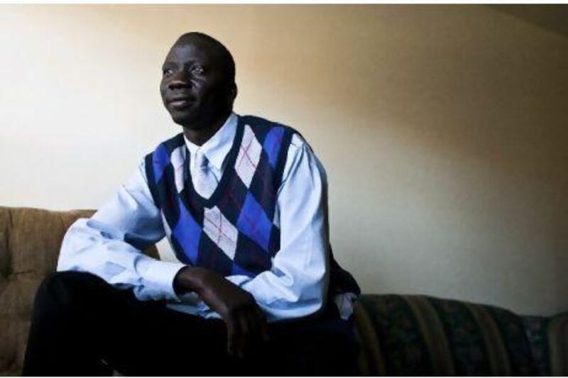 James Lubo Mijak at his home in Charlotte, North Carolina. He reached the United States as a young refugee from Sudan's civil war a decade ago. Now he plans to trade in the luxuries of American life and return to help build the world's newest state.