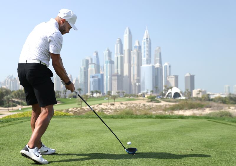 Alex Oxlade-Chamberlain plays in the Slync.io Dubai Desert Classic pro am. Getty