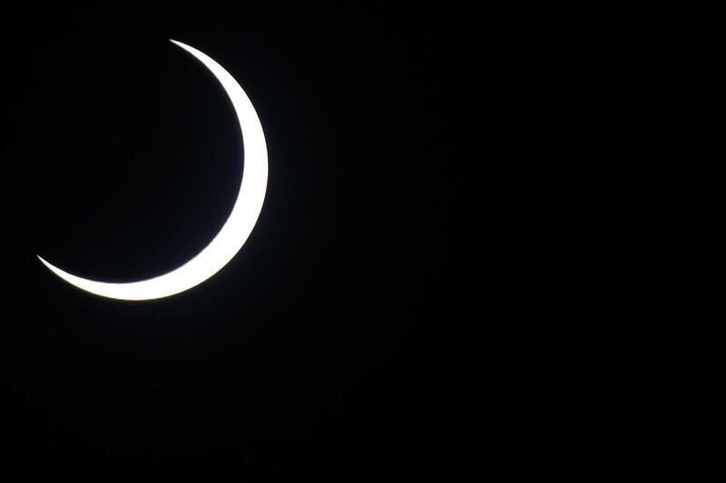 The moon covers the sun in a rare "ring of fire" solar eclipse as seen from Colombo. AFP