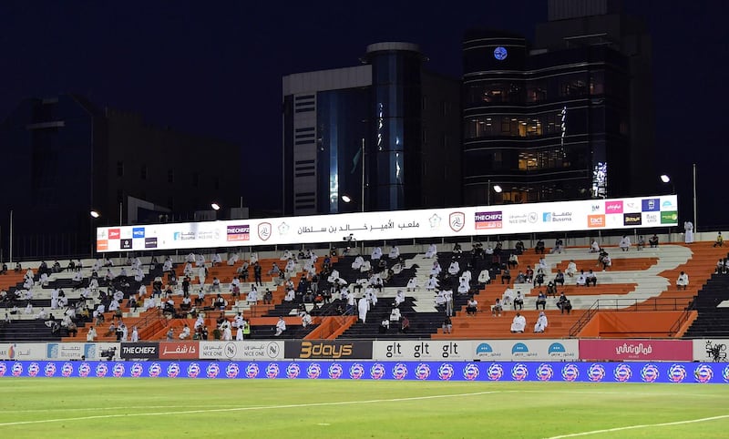 Physically distanced fans at the Saudi Professional League football match between Al-Shabab and Al-Ain at Prince Khaled bin Sultan Stadium in Riyadh. EPA