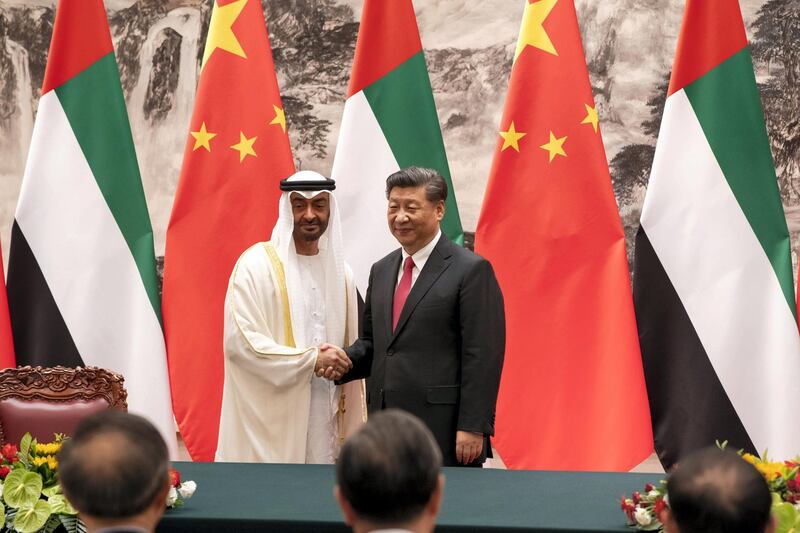 BEIJING, CHINA - July 22, 2019: HH Sheikh Mohamed bin Zayed Al Nahyan, Crown Prince of Abu Dhabi and Deputy Supreme Commander of the UAE Armed Forces (L) and HE Xi Jinping, President of China (R), stand for a photograph after memorandum of understanding exchange, at the Great Hall of the People.

( Mohamed Al Hammadi / Ministry of Presidential Affairs )
---