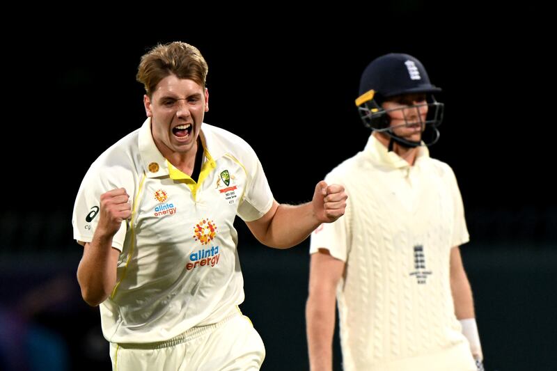 Australia bowler Cameron Green celebrates after bowling Dawid Malan of England for 10. Getty