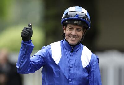 Jockey Jim Crowley celebrates winning the Sprint Cup with horse Minzaal. PA