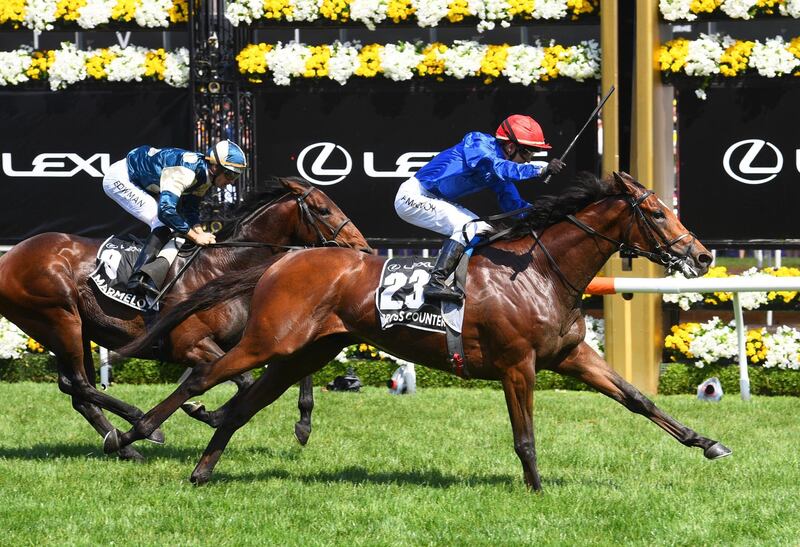 Kerrin McEvoy riding Cross Counter defeats Hugh Bowman riding Marmelo in Race 7 to win the Melbourne Cup at Flemington Racecourse. Getty Images