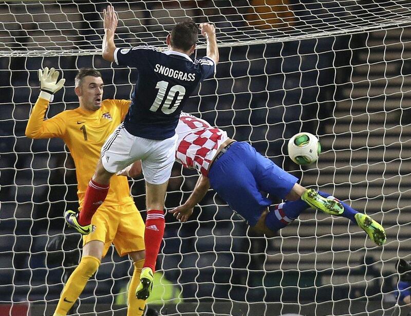 Scotland 2-0 Croatia. Robert Snodgrass, above, put the Scots ahead in the 28th minute and Steven Naismith added another in the 73rd to send the Croatians off to a play-off following a disappointing qualification campaign. Croatia manager Igor Stimac offered to resign his position following the loss. Scott Heppell / AP