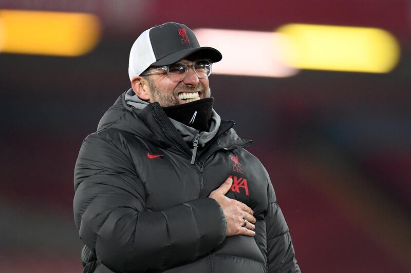 Klopp gestures to the fans. AP