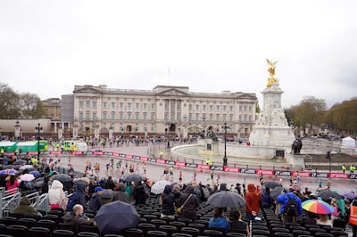 Competitors pass Buckingham Palace during the TCS London Marathon. PA