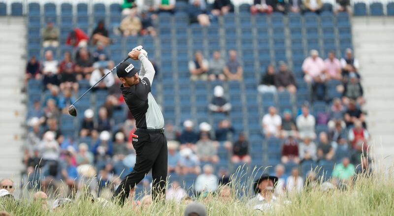 South Africa's Louis Oosthuizen plays a shot on the 17th during the first round of the British Open at Royal St George's in England, on  Thursday, July 15.