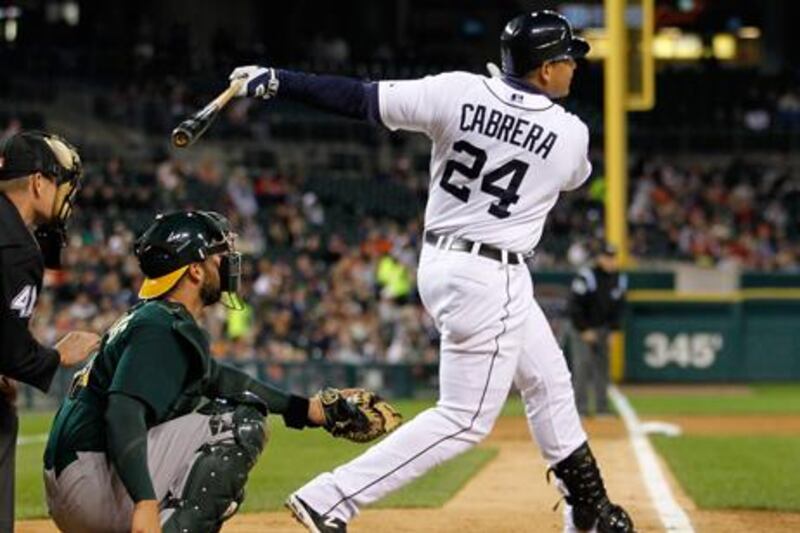 Miguel Cabrera hits a fifth innings double against Oakland for the Detroit Tigers