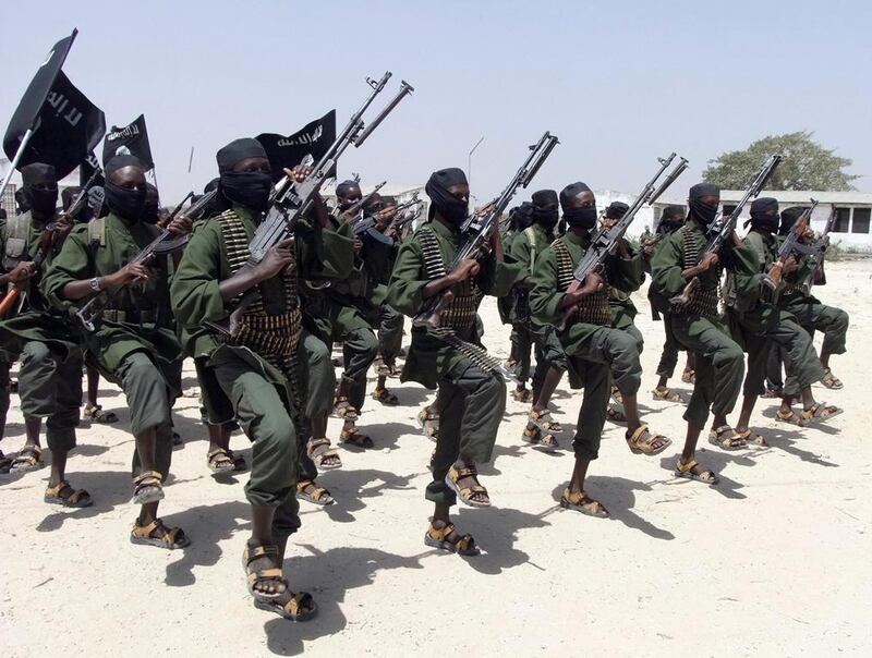 Al Shabab fighters perform military drills in the Lafofe area. about 18 kilometres south of Somalia's capital, Mogadishu, in 2015. AP Photo