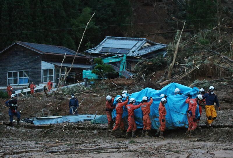 Record rainfall triggered massive floods and landslides, forcing authorities to issue evacuation advisories for more than 200,000 residents. AFP