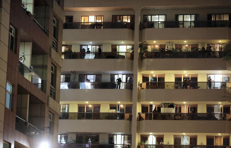 DUBAI, UNITED ARAB EMIRATES , March 25 – 2020 :- UAE residents cheering from their balconies and homes on Wednesday night at Al Mankhool area in Bur Dubai for doctors and medical staff for their tireless efforts in these critical times in Dubai. (Pawan Singh / The National) For News/Online/Standalone/Instagram