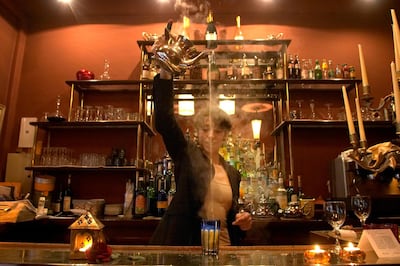 Ex Ed Alcock in Paris +33 6 16 89 95 43

Caption: A waitress prepares mint tea at the bar in Moroccan restaurant, La Villa Mauresque, 5-7 rue Commandant Riviere, in the 8th arrondissement of Paris.

Photo (c) Ed Alcock 1/11/2005 