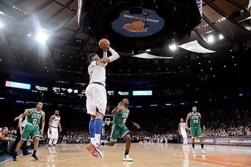 Carmelo Anthony has not been able to carry the New York Knicks alone, says the columnist. Andrew Gombert / EPA