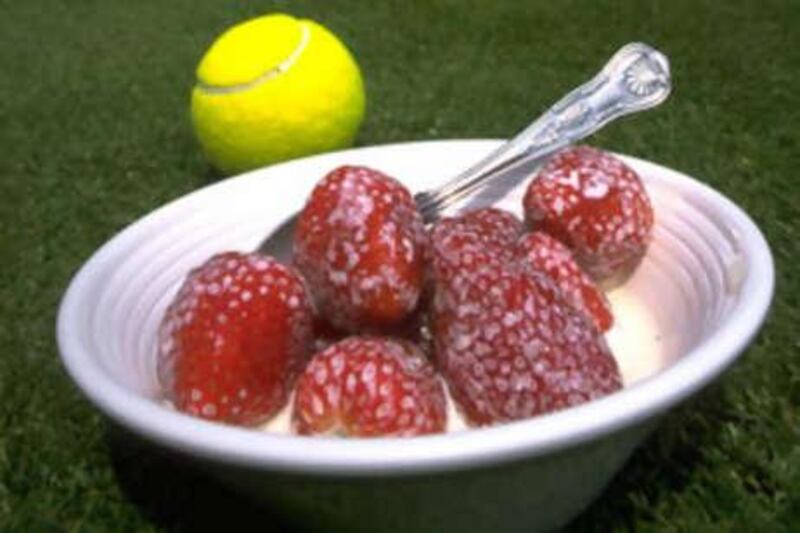 Strawberries and cream on Centre Court at the All England Club, home of the Wimbledon Championships.