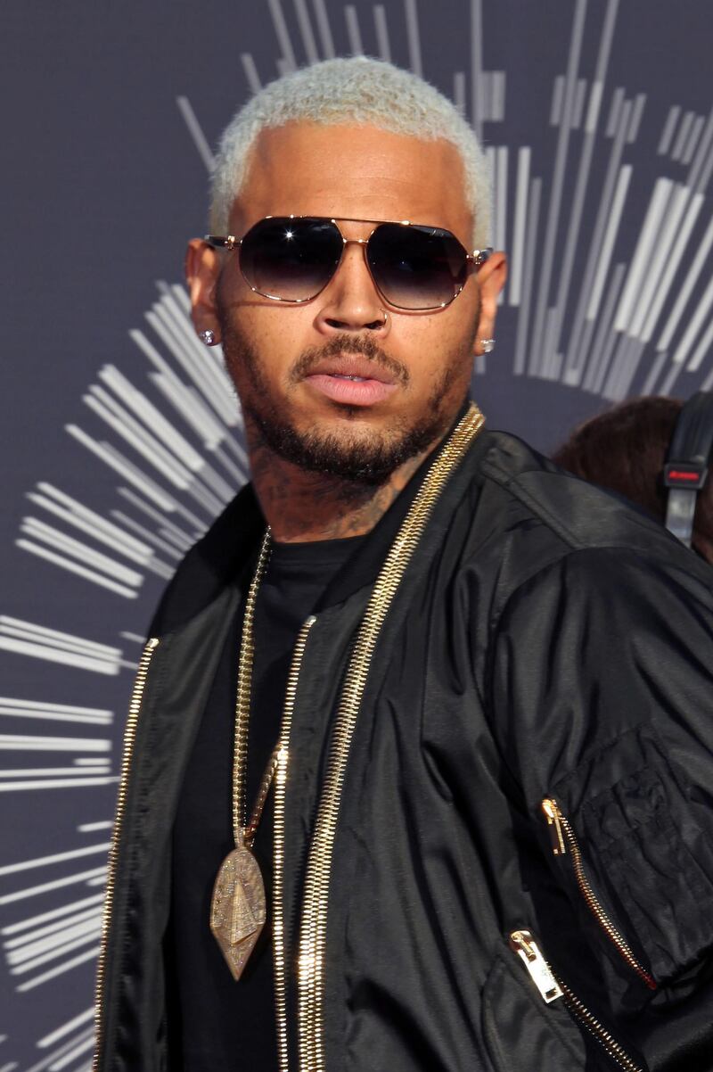epa07308858 (FILE) - US musician Chris Brown arrives on the red carpet for the 31st MTV Video Music Awards at The Forum in Inglewood, California, USA, 24 August 2014 (reissued 22 January 2019). According to media reports on 22 January 2019, Brown is under investigation by French police after a 24-year-old woman accused him of rape. She claims that the rapper assaulted her in his hotel room in Paris, France earlier this month.  EPA/JIMMY MORRISON *** Local Caption *** 51534682