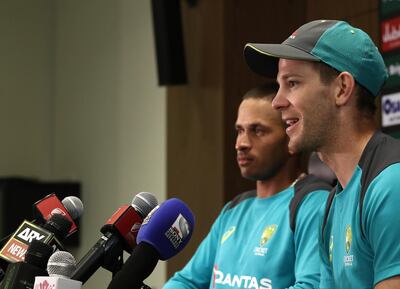 DUBAI, UNITED ARAB EMIRATES - OCTOBER 11: Tim Paine and Usman Khawaja of Australia speaks during a press conference after day five of the First Test match in the series between Australia and Pakistan at Dubai International Stadium on October 11, 2018 in Dubai, United Arab Emirates. (Photo by Ryan Pierse/Getty Images)