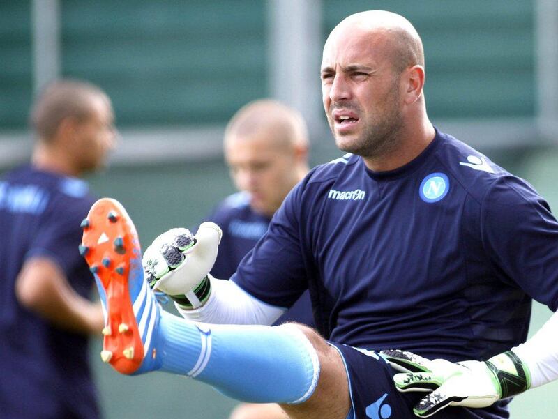 Pepe Reina was a little hurt after being loaned out by Liverpool, but the Spanish goalkeeper seems happy at Napoli. Carlo Hermann / AFP