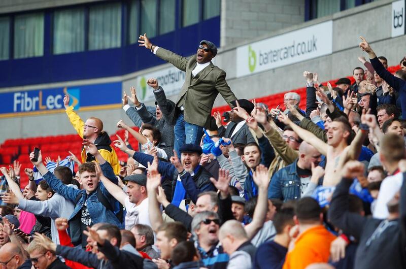 Birmingham City fans celebrate as they avoid relegation after the Championship match against Bolton Wanderers. Paul Thomas / Getty Images