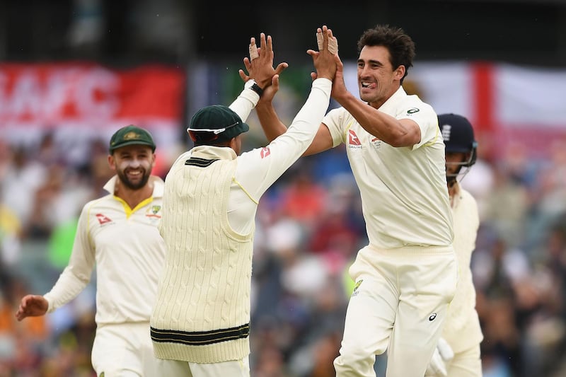 PERTH, AUSTRALIA - DECEMBER 17:  Mitchell Starc of Australia is congratulated by team mates after getting the wicket of James Vince of England during day four of the Third Test match during the 2017/18 Ashes Series between Australia and England at WACA on December 17, 2017 in Perth, Australia.  (Photo by Quinn Rooney/Getty Images)