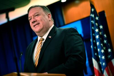 FILE - In this Wednesday, June 24, 2020 file photo, US Secretary of State Mike Pompeo speaks during a news conference at the State Department in Washington. On Tuesday, June 30, 2020, Pompeo and Iranâ€™s Foreign Minister Mohammed Javad Zarif are scheduled to address a U.N. Security Council meeting on implementation of the 2015 Iran nuclear deal that the Trump administration pulled out of as tensions between the two countries escalate. Tuesday's long-scheduled council meeting comes a day after Iran issued an arrest warrant for President Donald Trump and dozens of others for alleged involvement in the killing of an Iranian general. A key issue at Tuesdayâ€™s meeting is expected to be U.S. opposition to the lifting of a U.N. arms embargo on Iran in October. (Mandel Ngan/Pool via AP, File)