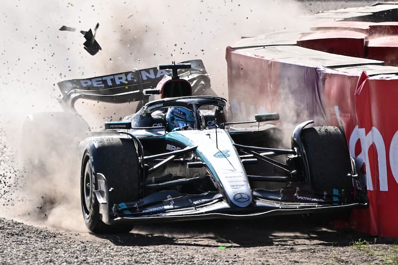 George Russell crashes into the barriers during the final laps of the Australian Grand Prix. AFP