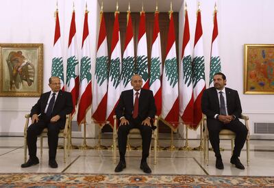 Lebanese prime minister Saad Hariri (R) meets President Michel Aoun (L) and Parliament  speaker Nabih Berri(C) at the presidential palace in Baadba on November 22, 2017. 
Lebanon's prime minister Saad Hariri returned to his home country late, on the eve of its independence day and after a nearly three-week absence dominated by his surprise resignation. / AFP PHOTO / STRINGER