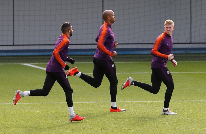 Kompany and De Bruyne during training. Action Images via Reuters
