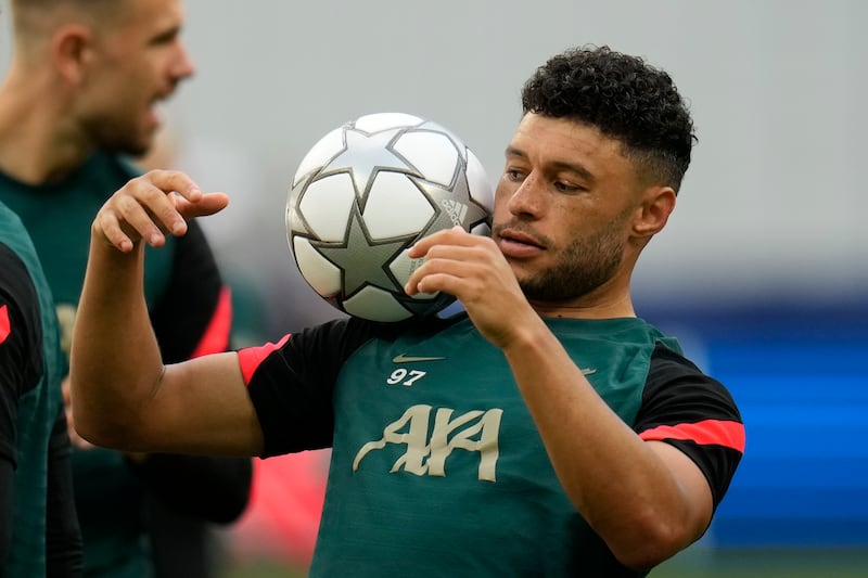 Liverpool's Alex Oxlade-Chamberlain controls the ball during a training session at the Stade de France. AP