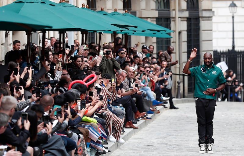 Ghanaian-American designer Virgil Abloh waves after the presentation of his spring/summer 2020 Men's collection for Louis Vuitton during the Paris Fashion Week, in Paris, France, 20 June 2019. EPA