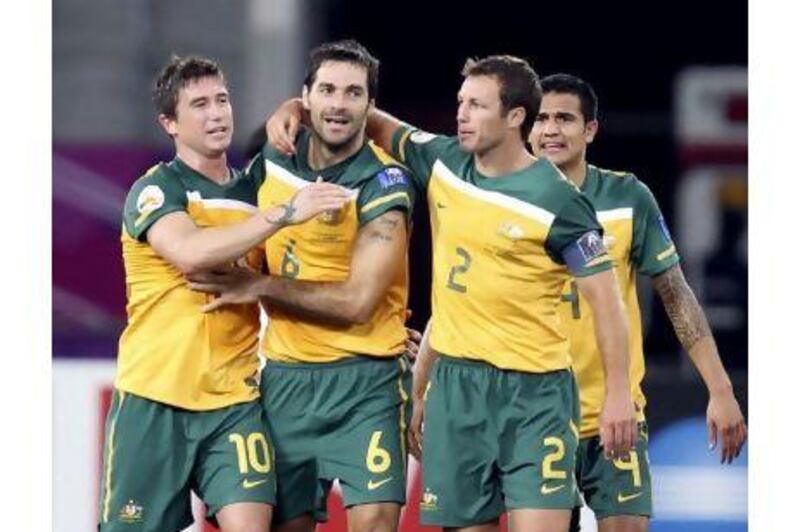 Australia's 'golden generation of Harry Kewell, left, Sasa Ognenovski, Lucas Neill and Tim Cahill, right. Tonight, they have the chance to win the most significant trophy in their country's history.