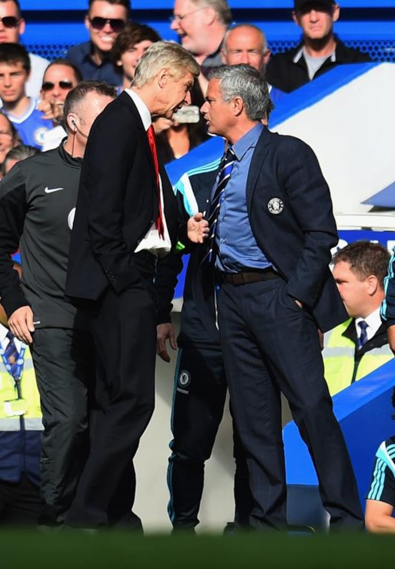 Arsene Wenger of Arsenal and Chelsea's and Jose Mourinho square up during a Premier League match in 2014. It's fair to say the two rivals were never the best of friends. Getty