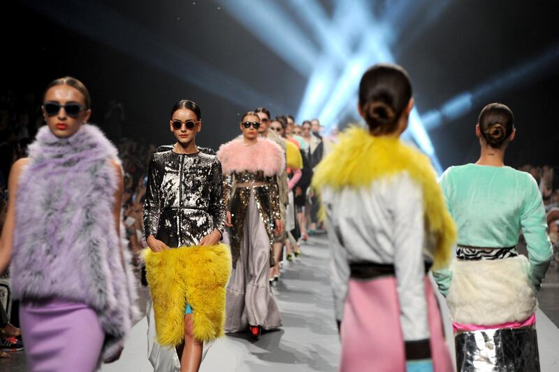 DUBAI, UNITED ARAB EMIRATES - APRIL 12:  Models walk the runway at the Essa show during Fashion Forward at Madinat Jumeirah on April 12, 2014 in Dubai, United Arab Emirates.  (Photo by Stuart C. Wilson/Getty Images for Fashion Forward)