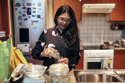 10.04.18 Amruta Kshemkalyani and her family who live a zero waste lifestyle by trying to waste as little as possible. In addition to recycling, she brings her own containers to the supermarket, buys clothes and furniture second hand. These are the reusable containers. She is a sustainability consultant and writes a blog about her lifestyle: http://www.sustainabilitytribe.com/. 
The Greens, Dubai.  Anna Nielsen For The National