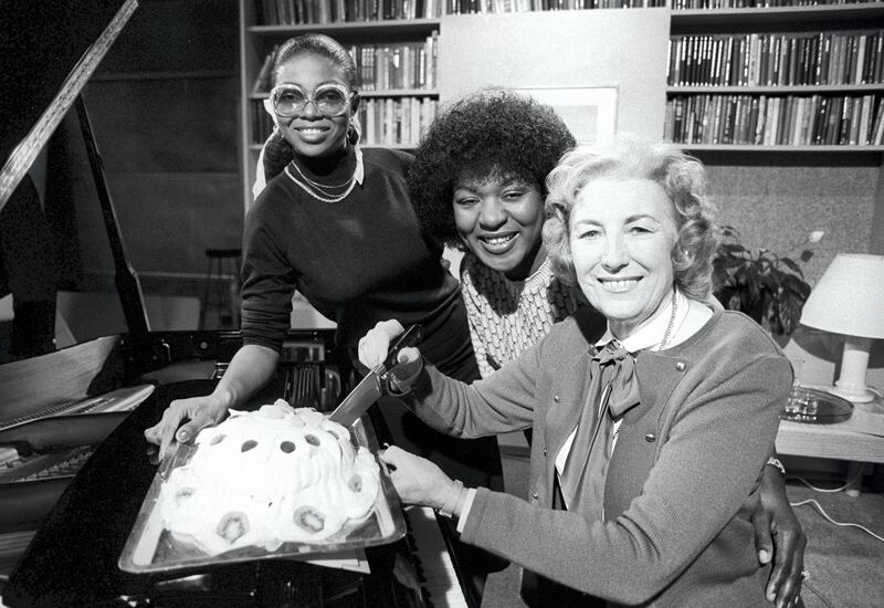 'Forces Sweetheart' Dame Vera Lynn (r) celebrates her 67th birthday on TV-AM's Good Morning Britain show with the show's resident cook, Rustie Lee (centre) and guest, singer Patti Boulaye, in London.
