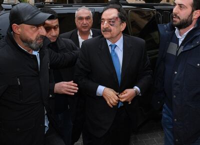 A handout picture provided by the Lebanese Parliament press office shows Lebanese MP Salim Saade arriving to attend a parliamentary session after being attacked by protesters, in the Lebanese capital Beirut on February 11, 2020.  Lebanon's parliament met for a confidence vote on a new government as security forces used teargas and water cannons to disperse protesters trying to prevent a quorum.
More than three months since massive protests brought down the government, demonstrators say the proposed new cabinet fails to address their demands and cannot rescue Lebanon's ailing economy. - === RESTRICTED TO EDITORIAL USE - MANDATORY CREDIT "AFP PHOTO / HO / LEBANESE PARLIAMENT PRESS OFFICE" - NO MARKETING - NO ADVERTISING CAMPAIGNS - DISTRIBUTED AS A SERVICE TO CLIENTS ===
 / AFP / LEBANESE PARLIAMENT / - / === RESTRICTED TO EDITORIAL USE - MANDATORY CREDIT "AFP PHOTO / HO / LEBANESE PARLIAMENT PRESS OFFICE" - NO MARKETING - NO ADVERTISING CAMPAIGNS - DISTRIBUTED AS A SERVICE TO CLIENTS ===
