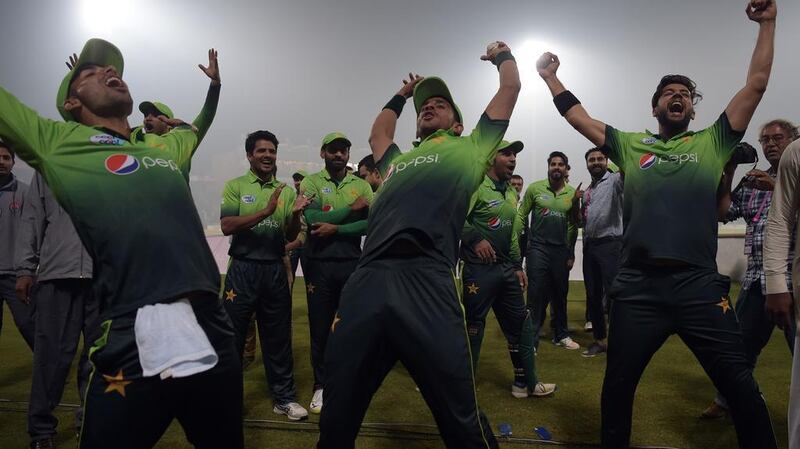 Pakistan players celebrate after winning the third and final T20 against Sri Lanka at Gaddafi Stadium in Lahore. Aamir Qureshi / AFP